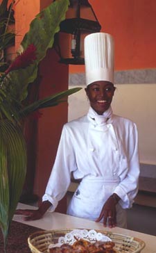 Young local woman, Caribbean resort buffet